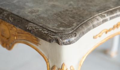 PAIR OF MID 18TH CENTURY GILT AND PAINTED CONSOLE TABLES