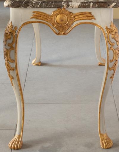 PAIR OF MID 18TH CENTURY GILT AND PAINTED CONSOLE TABLES