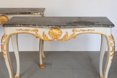 PAIR OF MID 18TH CENTURY GILT AND PAINTED CONSOLE TABLES