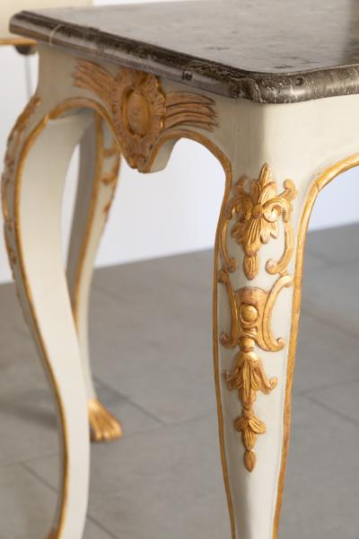 PAIR OF MID 18TH CENTURY GILT AND PAINTED CONSOLE TABLES