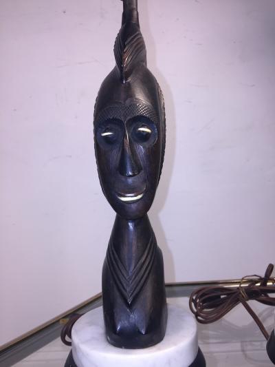 PAIR OF MID CENTURY CARVED WOOD AFRICAN BUST ON TRIPOD MARBLE BASE LAMPS