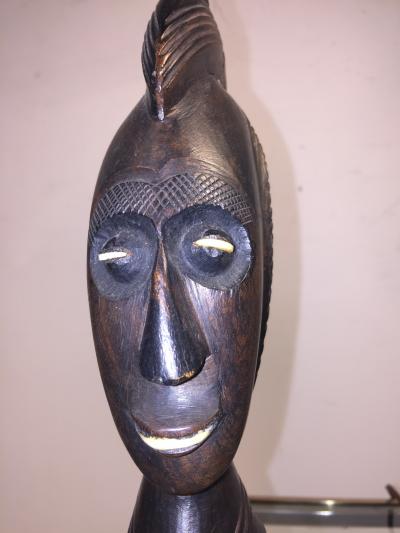 PAIR OF MID CENTURY CARVED WOOD AFRICAN BUST ON TRIPOD MARBLE BASE LAMPS