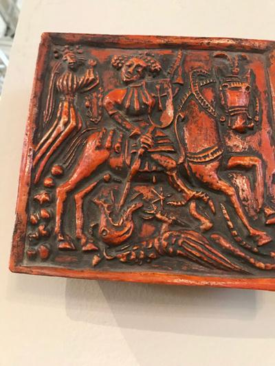 PAIR OF PAINTED DUTCH MEDIEVAL STYLE GLAZED TERRACOTTA RELIEFS PLAQUES