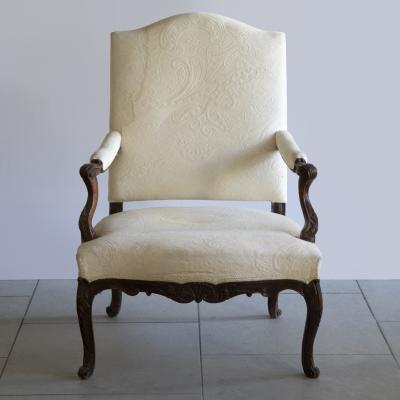 PAIR OF R GENCE PERIOD CARVED AND STAINED BEECH FAUTEUILS