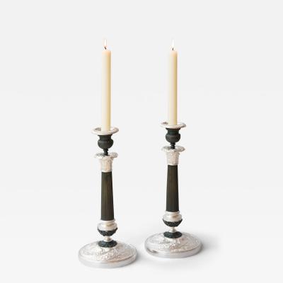 PAIR OF RESTAURATION PATINATED BRONZE AND BRONZE SILVER PLATED CANDLESTICKS