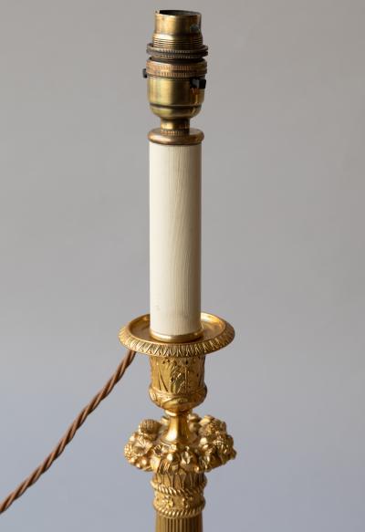 PAIR OF RESTAURATION PERIOD GILT BRONZE CANDLESTICKS CONVERTED TO TABLE LAMPS