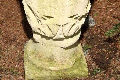 PAIR OF TALL CARVED STONE FLAME FINIALS