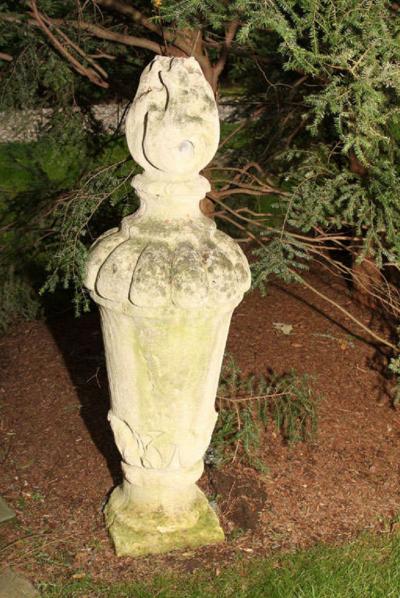 PAIR OF TALL CARVED STONE FLAME FINIALS