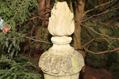 PAIR OF TALL CARVED STONE FLAME FINIALS