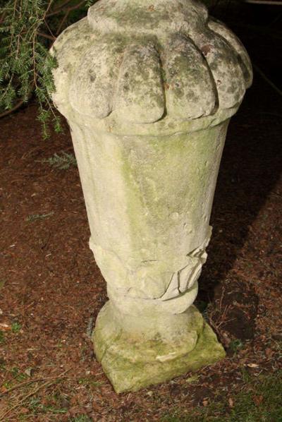 PAIR OF TALL CARVED STONE FLAME FINIALS