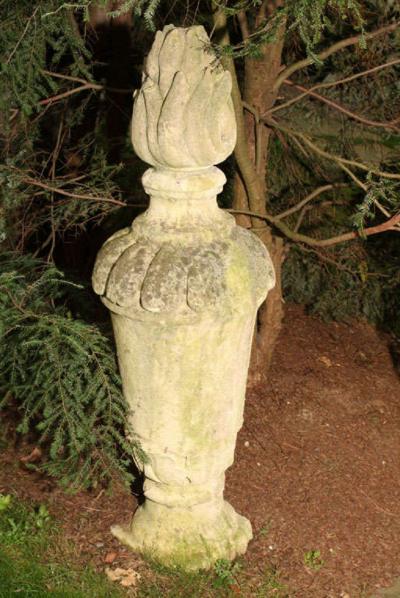 PAIR OF TALL CARVED STONE FLAME FINIALS