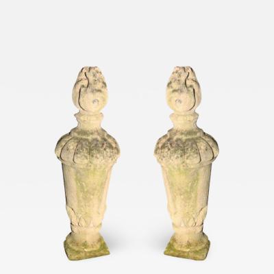 PAIR OF TALL CARVED STONE FLAME FINIALS