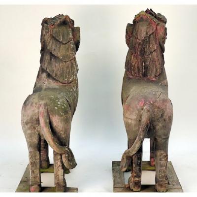 PAIR OF WOOD PALACE LIONS S E ASIA WEATHERED WITH MICA EYES