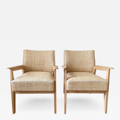 PAIR OF WOVEN STRAW ARMCHAIRS