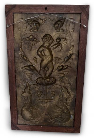 PAIR of French Victorian oak framed brass embossed cupid wall plaques