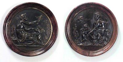 PAIR of French Victorian round walnut framed bronze wall plaques