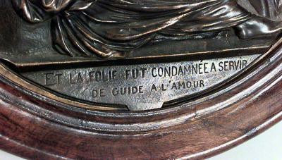 PAIR of French Victorian round walnut framed bronze wall plaques