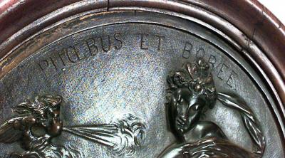 PAIR of French Victorian round walnut framed bronze wall plaques