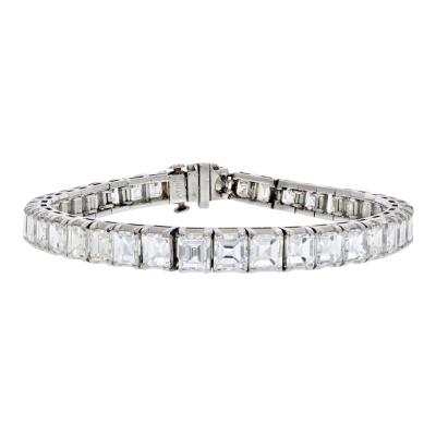 PLATINUM 21 CARAT SQUARE EMERALD CUT TENNIS BRACELET