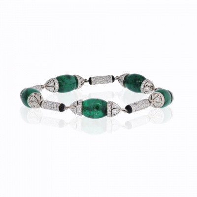 PLATINUM GREEN EMERALDS DIAMONDS AND ONYX VINTAGE BRACELET