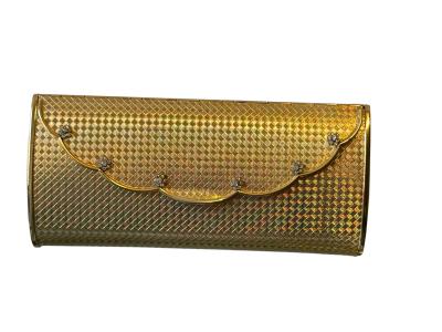 POLISHED GOLDTONE METAL CLUTCH WITH RHINESTONE FLORET ACCENTS