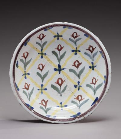 PROBABLY ENGLISH DELFTWARE TULIP CHARGER