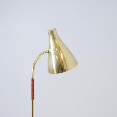 Paavo Tynell A Paavo Tynell Perforated Brass and Leather Floor Lamp Model 9607 Taito 1950s