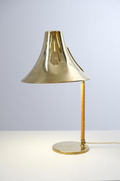 Paavo Tynell A Paavo Tynell Perforated Brass and Rattan Table Lamp 9208 Taito 1940s