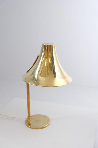 Paavo Tynell A Paavo Tynell Perforated Brass and Rattan Table Lamp 9208 Taito 1940s