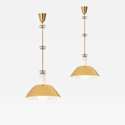 Paavo Tynell A pair of ceiling lamps model K2 20 designed by Paavo Tynell for Idman Oy