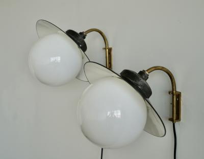 Paavo Tynell A pair of indoor outdoor wall lights by Paavo Tynell for Taito