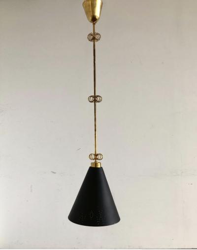 Paavo Tynell A pair of pendant by Paavo Tynell for Idman