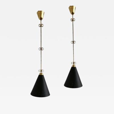 Paavo Tynell A pair of pendant by Paavo Tynell for Idman