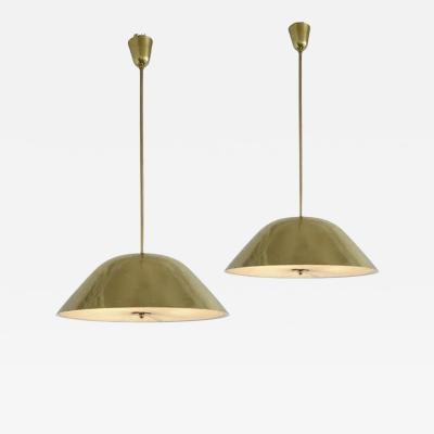 Paavo Tynell A pair of pendants by Paavo Tynell for Taito Oy