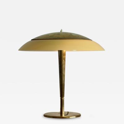 Paavo Tynell A table lamp by Paavo Tynell for Taito