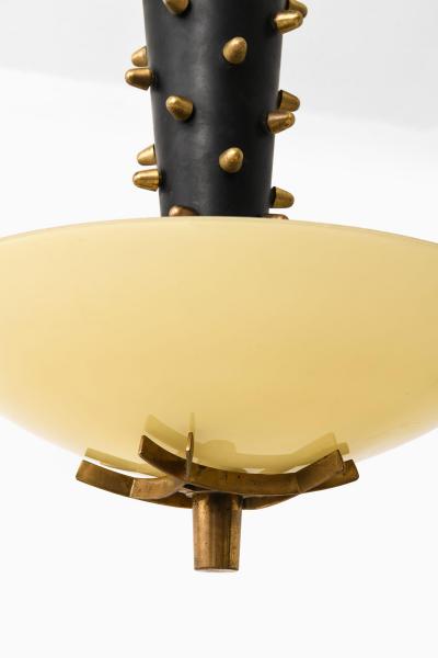 Paavo Tynell Early Ceiling Lamp in Black Metal Opaline Glass Brass by Paavo Tynell 1940s