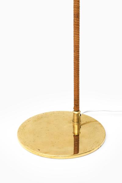 Paavo Tynell Floor Lamp in Brass and Cane by Paavo Tynell 1950s