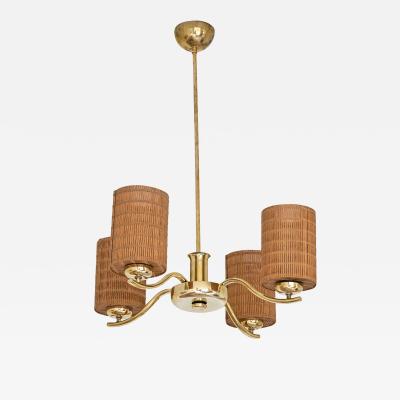 Paavo Tynell Paavo Tynell Four Arm Brass Chandelier Model 1444 Taito OY Finland 1930s