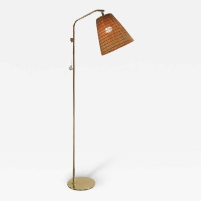Paavo Tynell Paavo Tynell Full Brass Floor Lamp Model 9613 with Rattan Shade Taito
