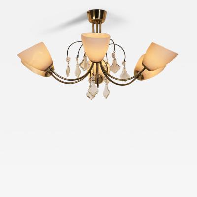 Paavo Tynell Paavo Tynell Model K1 12 Chandelier for Idman Finland Mid 20th Century