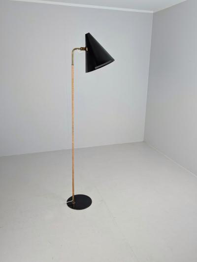 Paavo Tynell Paavo Tynell Nuns Hat Floor Lamp in Black Brass and Rattan Idman 1950s