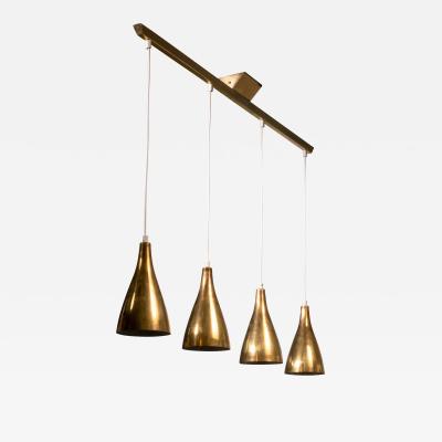 Paavo Tynell Paavo Tynell brass four shade lamp for Idman