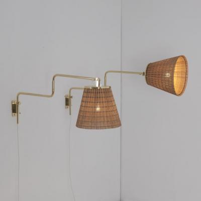 Paavo Tynell Pair of Paavo Tynell Adjustable Rattan Shade Wall Lights Model 9414 Taito 1950s