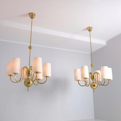 Paavo Tynell Pair of Paavo Tynell Commissioned Chandeliers in Brass Fabric Taito 1940s