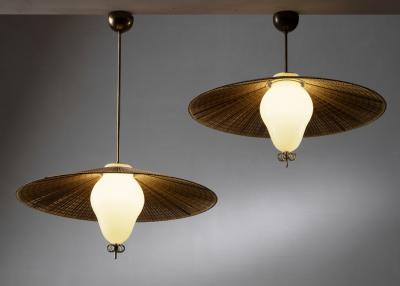 Paavo Tynell Pair of Paavo Tynell model 1090 pendants