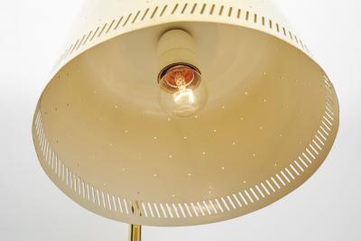 Paavo Tynell Rare Paavo Tynell Brass Perforated Wall Lamp for Taito Oy Finland 1950s