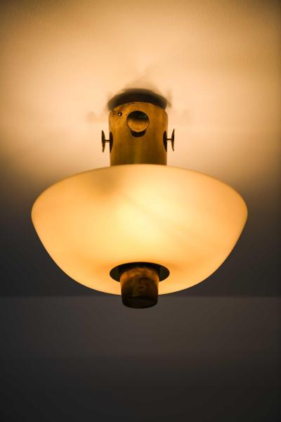 Paavo Tynell Scandinavian Modern Ceiling Lamp in Brass Opaline Glass by Paavo Tynell 1950s