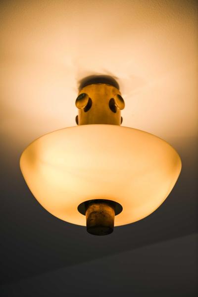 Paavo Tynell Scandinavian Modern Ceiling Lamp in Brass Opaline Glass by Paavo Tynell 1950s
