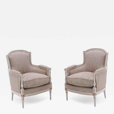 Painted and gilt Louis XVI style bergere chairs circa 1950 