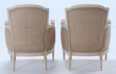 Painted and gilt Louis XVI style bergere chairs circa 1950 
